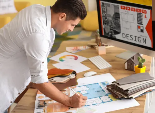 male interior designer with computer